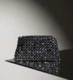 The Shadow Diamond Bag is a beaed handbag that is made with crystal beads. This is totally handmade bag.