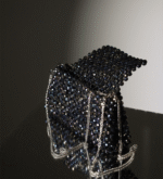 The Shadow Diamond Bag is a beaed handbag that is made with crystal beads. This is totally handmade bag.