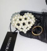 The pearl heart keychain which is totally handmade with pearl beads.