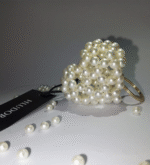 The pearl heart keychain which is totally handmade with pearl beads.